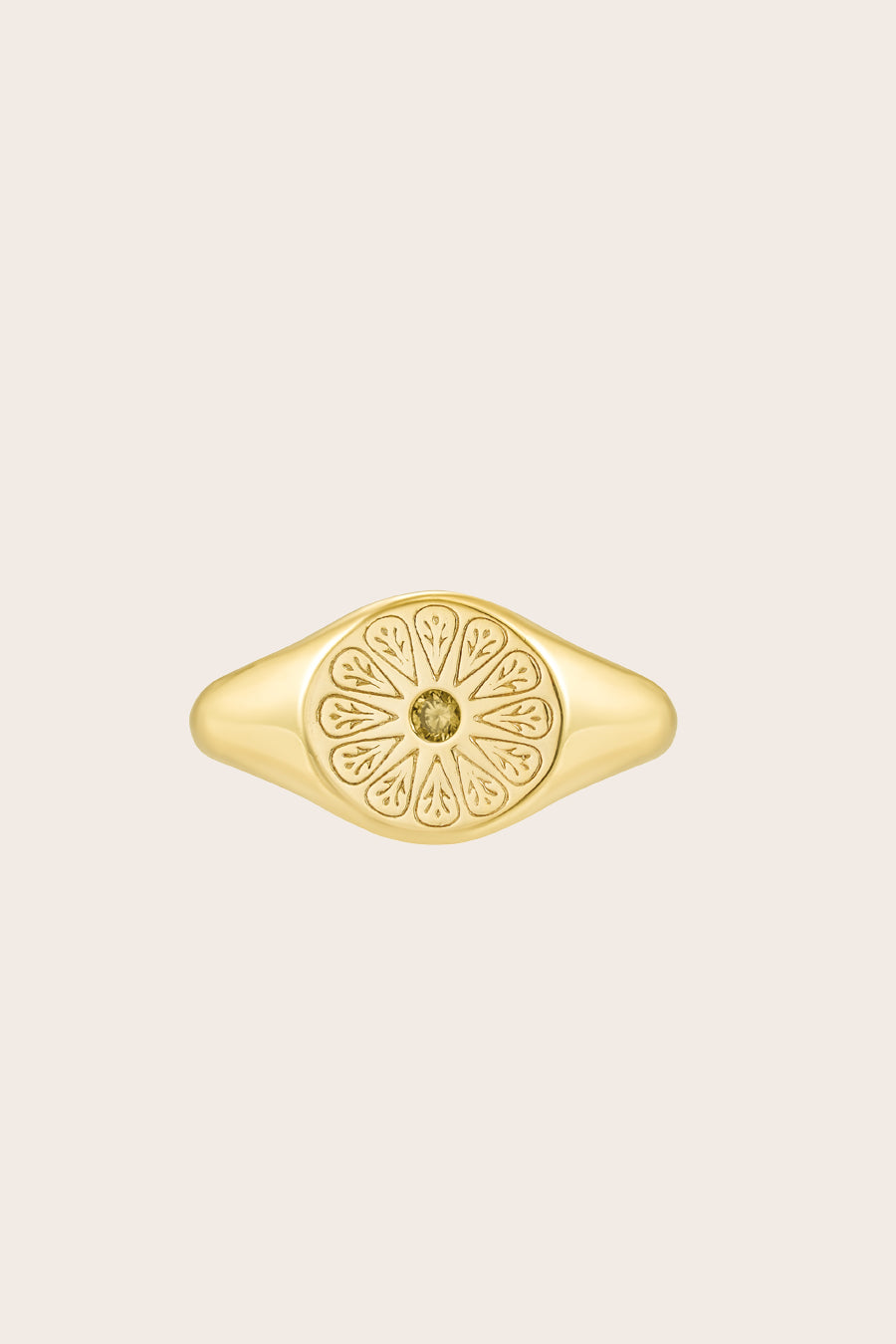 August Peridot Birthstone Signet Ring in gold on cream background