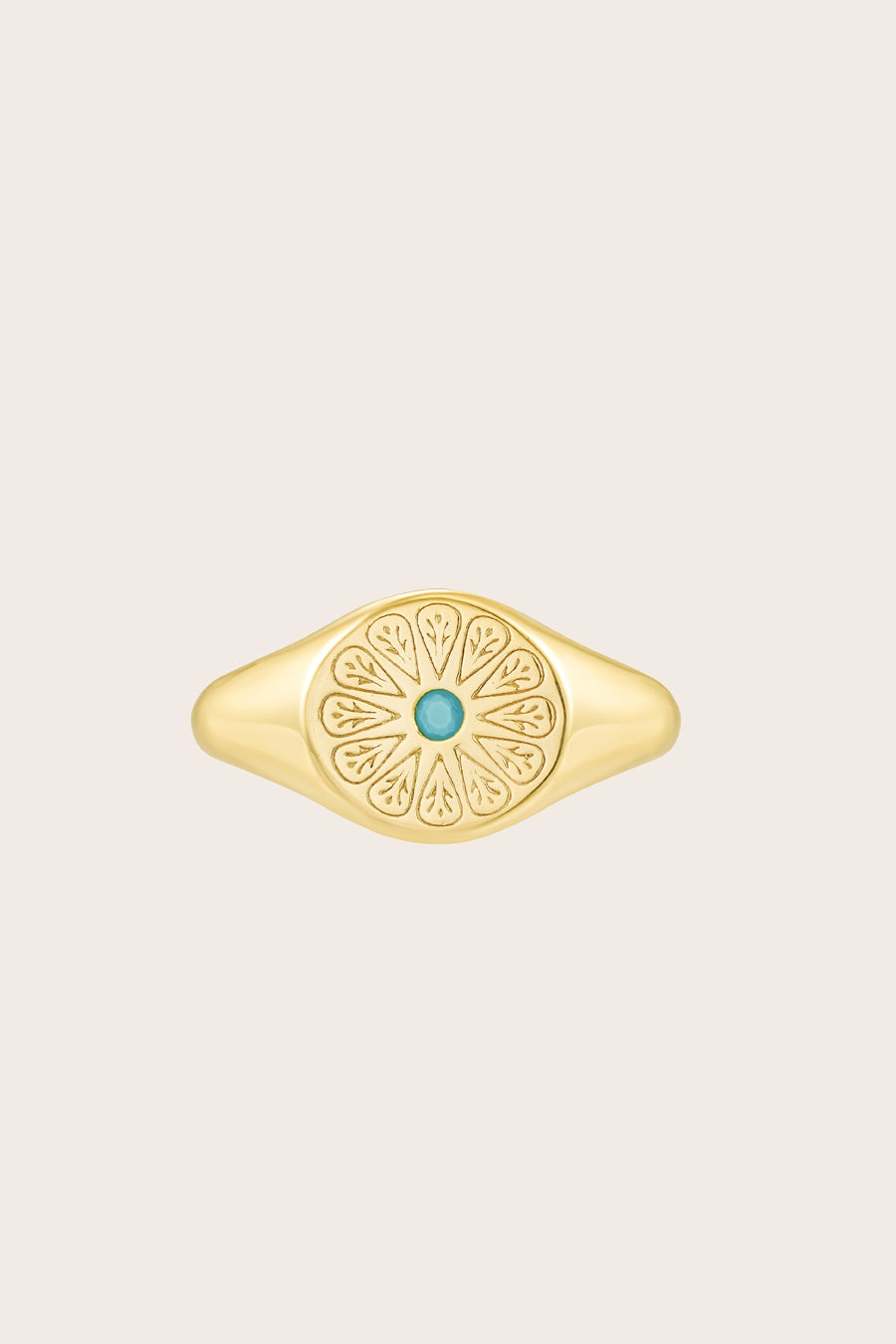 Gold Turquoise December Signet Birthstone Ring on cream background