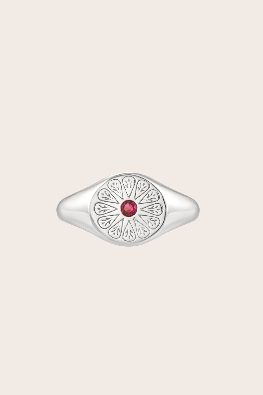 Silver July Ruby Signet Birthstone Ring on cream background