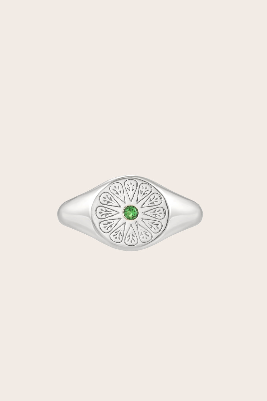 Silver May Emerald Signet Birthstone Ring on cream background