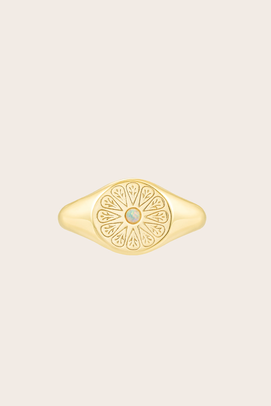 Gold October Opal Signet Birthstone Ring on cream background