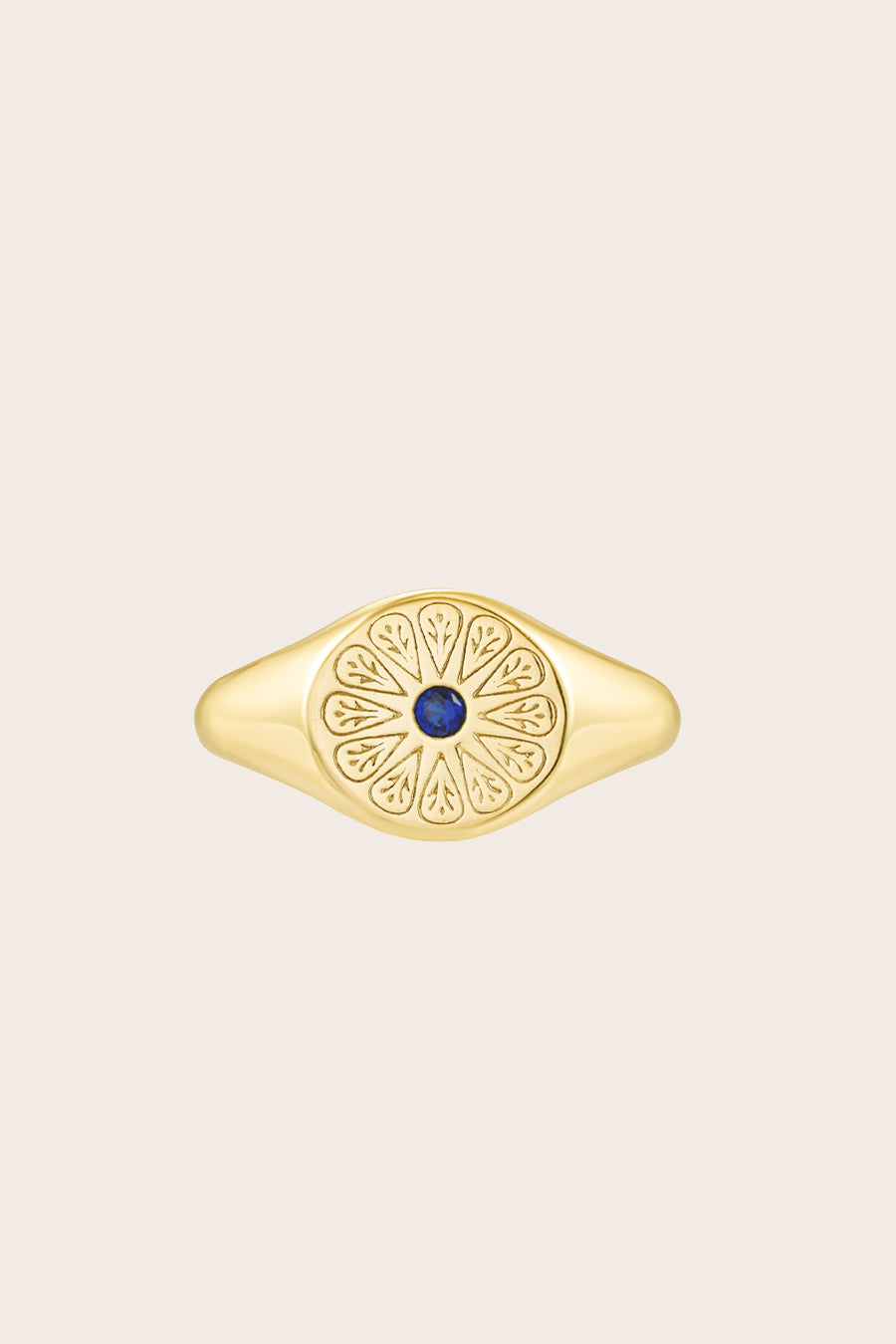 Gold September Sapphire Signet Birthstone Ring on Cream background